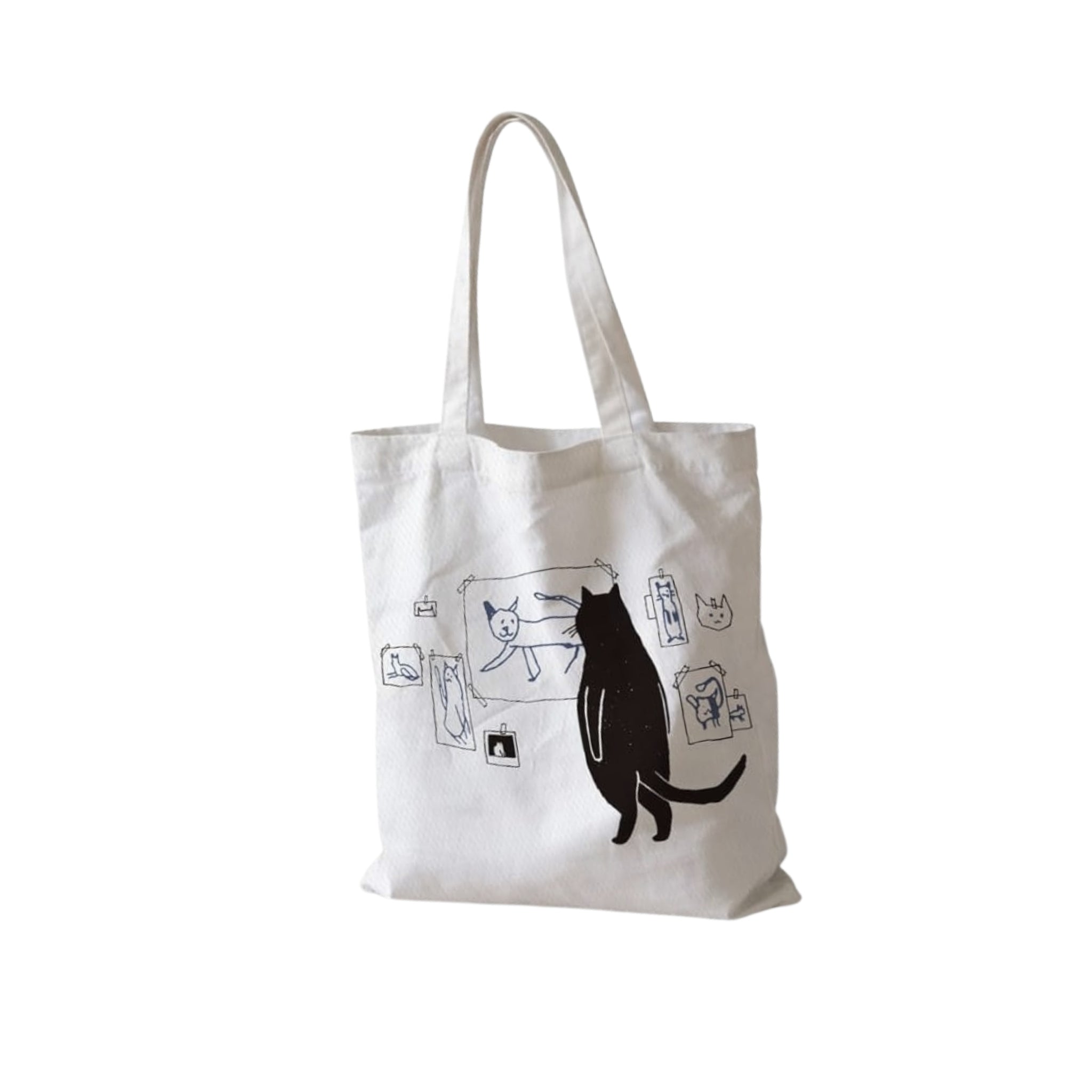 the cat artist tote bag