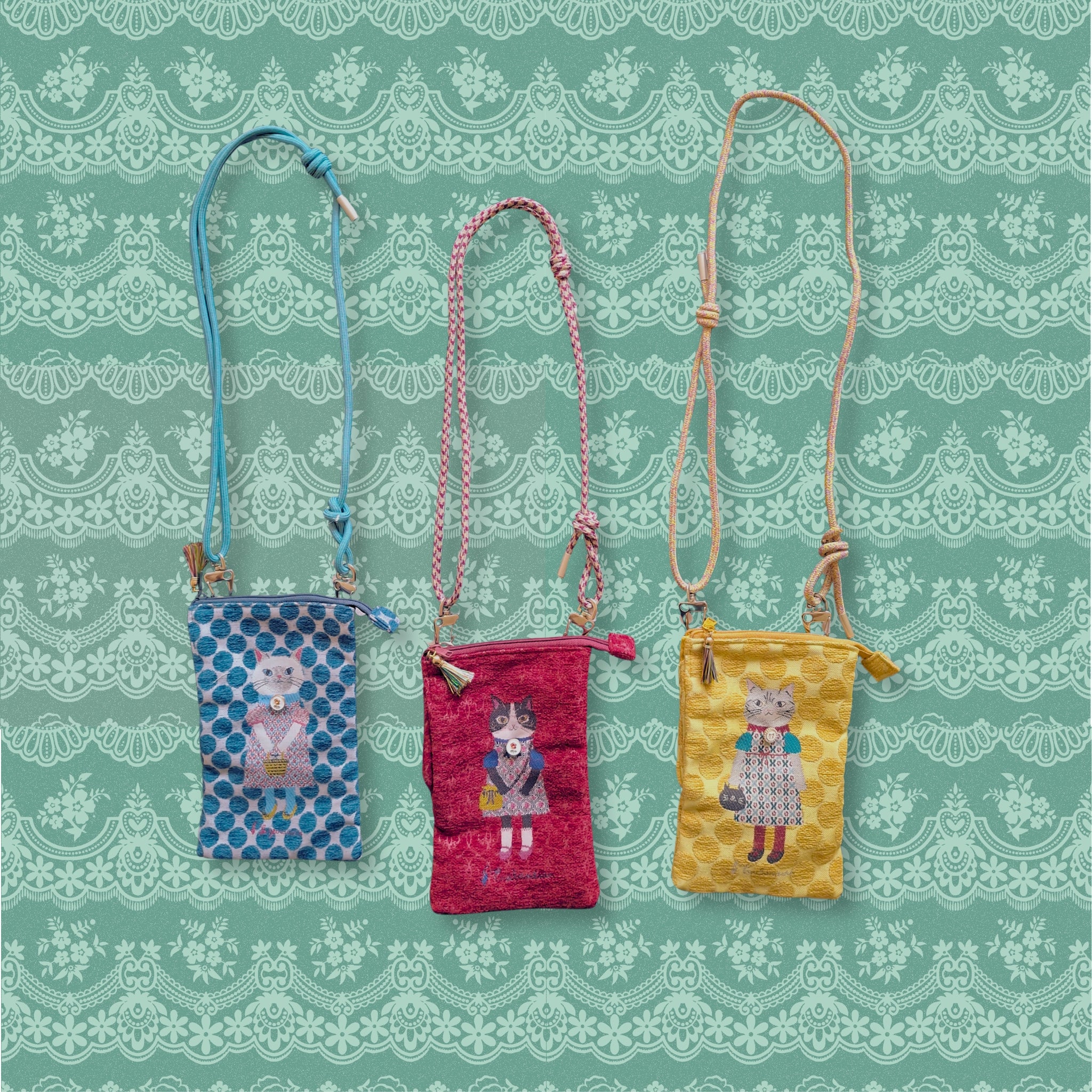 the embroidered cat crossbody bag
