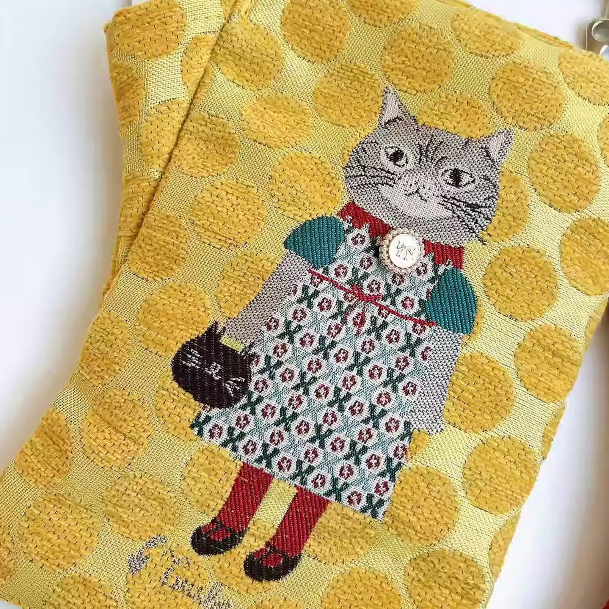 the embroidered cat crossbody bag