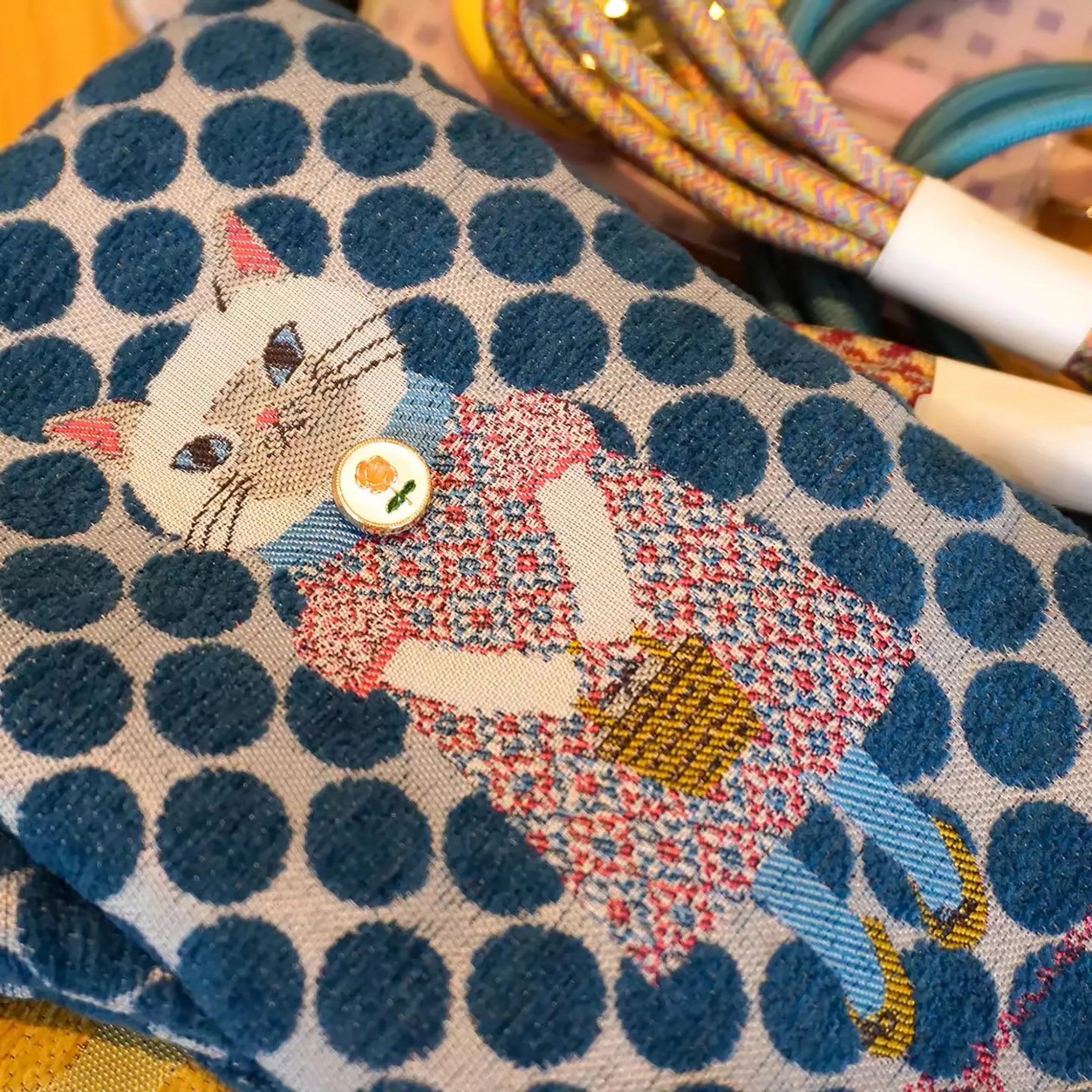the embroidered cat crossbody bag